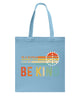 Image of Be Kind In A World You Can Be Anything T-Shirt - Basketweave Tote Bag - Mug